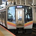 Photos: E129系白新線豊栄行き新潟駅高架ホーム発車