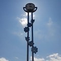 写真: 逆光のゆうゆうパークの時計台（8月18日）
