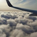 写真: 羽田上空雲の上