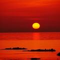 写真: 落陽　能登は赤住海岸