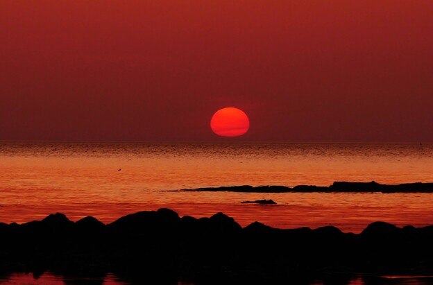 写真: 落陽　能登　上野海岸