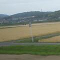 写真: 車窓からの麦畑〜