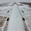 写真: 雪の着陸