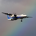 Photos: 時雨が去りQ400と虹