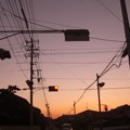 写真: 雲のない夕日